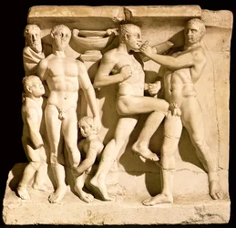 Relief föreställande brottare